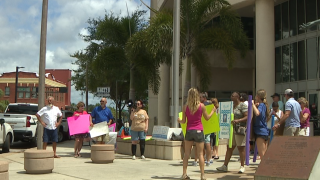 Frustrated homeowners in Tampa protested against pool contractors 