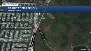 Barricaded woman shoots partner in Hernando Beach home